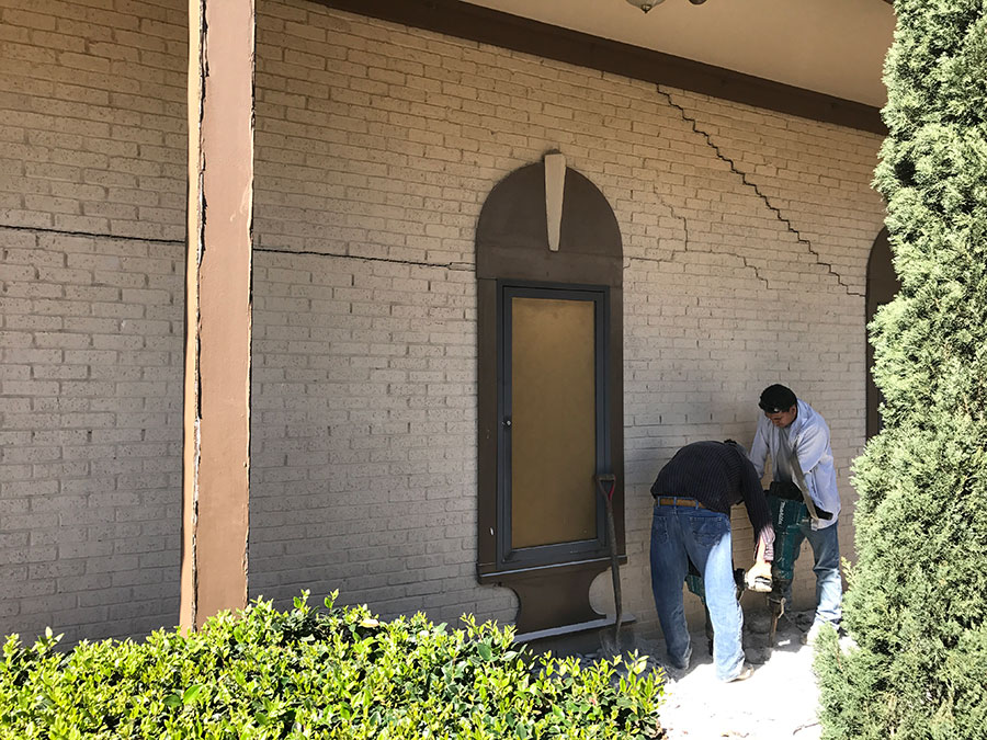 Professionals from Pier Pressure Foundation Repair working on a repair work